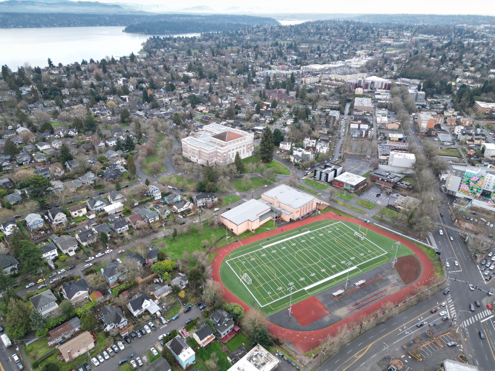 Aerial photograph of Franklin High School, its field and track, with Lake Washington beyond