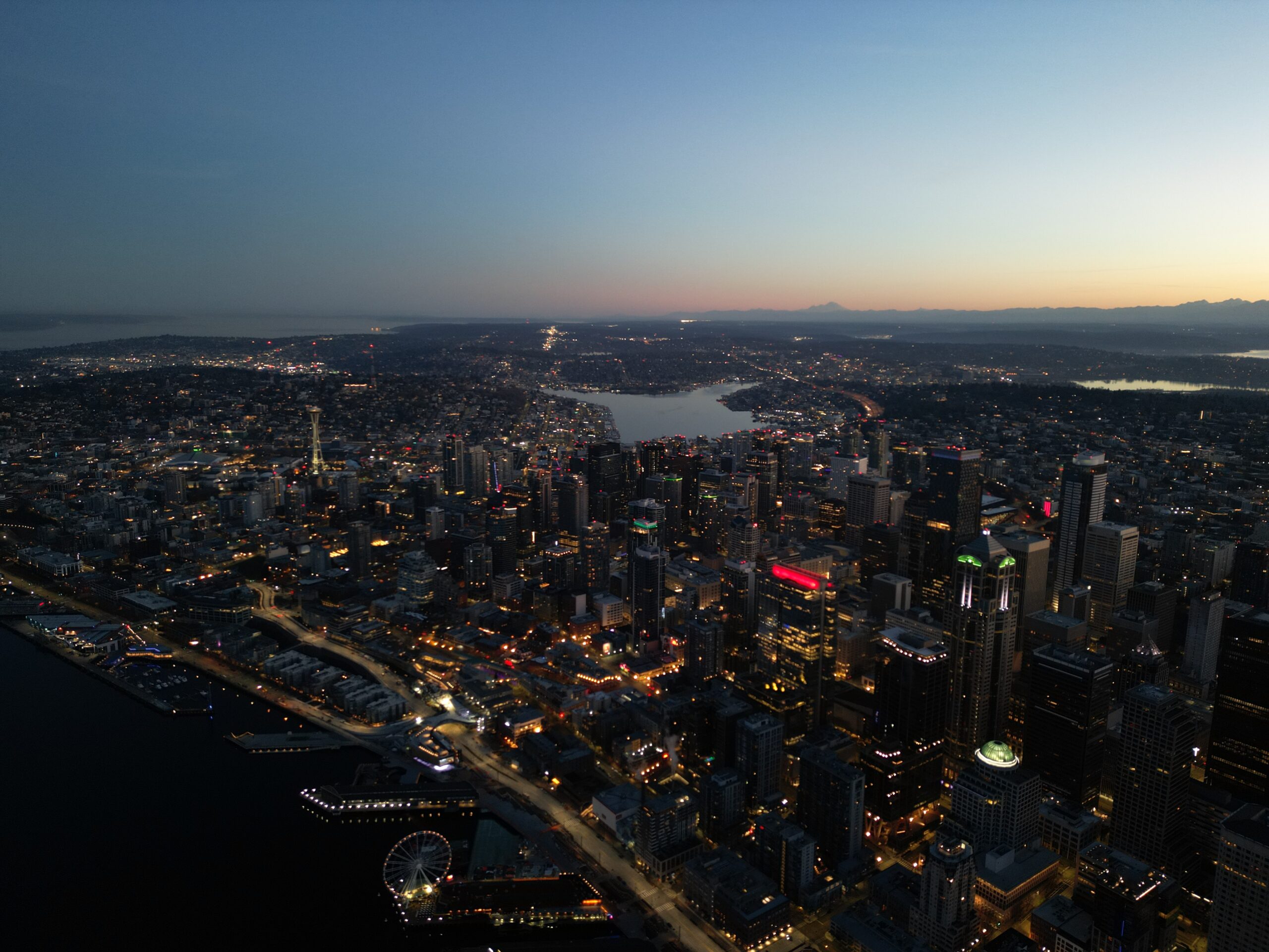 Seattle city lights at sunset from above